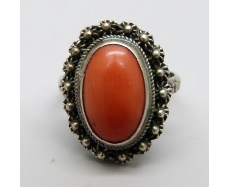 An 800 silver and coral ring, I/J 