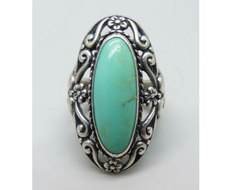 A Caroline Pollock silver and turquoise ring, L 