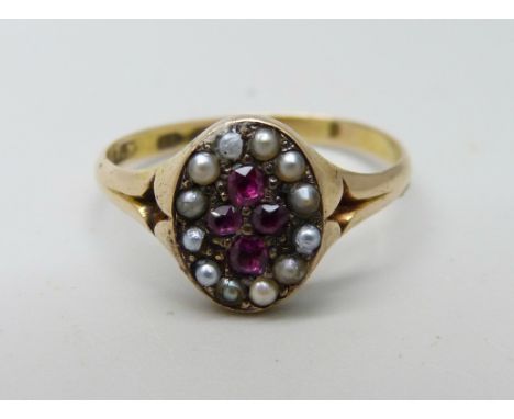 An antique 15ct gold, ruby and half pearl cluster ring, some pearls a/f, 3.3g, R 