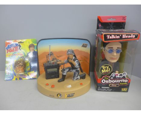 An Action Man alarm clock, an Ozzy Talkin' Heads figure and an Austin Powers talking key chain 