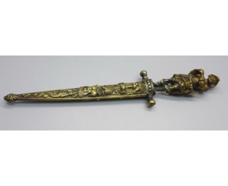 A dagger with brass figural handle and decorated blade, with scabbard, length without scabbard 20.5cm 