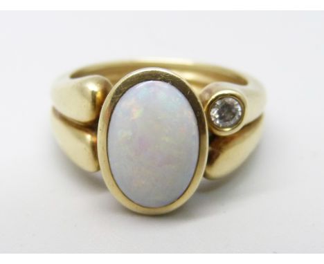 A 14ct gold, opal and diamond ring, 8.9g, P/Q, opal 8mm x 12mm 