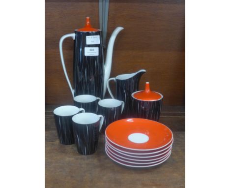 A Polish Cmielow six setting coffee service, six saucers, four cups, sugar, cream and a coffee pot&nbsp;&nbsp;**PLEASE NOTE T