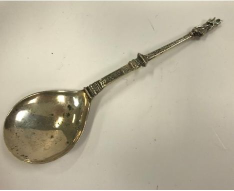 An early Continental Apostle spoon with peardrop bowl and dragon scale decorated handle, unusual marks, bears ownership initi