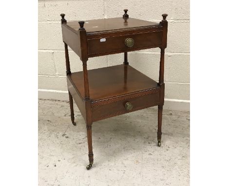 A Regency mahogany toilet mirror, the rectangular plate on reeded supports to a rosewood and crossbanded satinwood strung thr