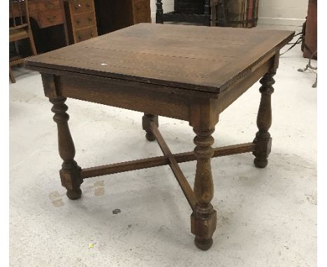 A 19th Century mahogany rectangular drop-leaf dining table, 139 cm wide x 113 cm deep x 70 cm high, together with a stained b