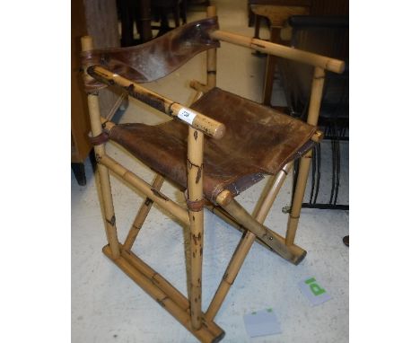 A pair of vintage bamboo framed and leather seated folding chairs 74 cm high x 46 cm deep CONDITION REPORTS Bamboo chairs - t