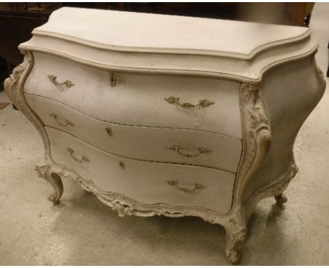 A modern painted bombe commode in the Venetian style, bears label inscribed "Cicchetti Mobilificio Genova", 121 cm wide x 55 