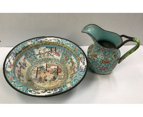 A Chinese Canton enamel on copper bowl, the centre field decorated with figures in an interior within four further panels dep