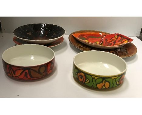 A collection of Poole pottery bowls, platters, etc. to include Cynthia Bennett, Nina Fancy, Ann Lloyd, Mary Lowman, etc