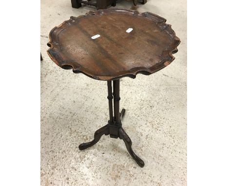 A reproduction mahogany cluster column wine table on tripod base, a mahogany three section record cabinet, a velum covered tr