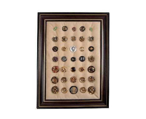 BIMINI: A COLLECTION OF THIRTY TWO GLASS BUTTONS, designs probably by Dame Lucie Rie, painted in polychrome with gilt highlig