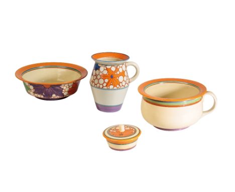 CLARICE CLIFF: A NEWPORT POTTERY FANTASQUE FOUR-PIECE BASIN SET, comprising jug, wash-bowl, chamber pot, powder pot and cover