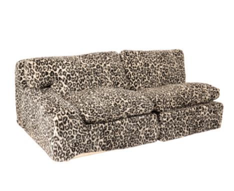 DAVID SYLVESTER: A LEOPARD PRINT "L" SHAPED SOFA, 236cm wide x 182cm deep x 60cm high 