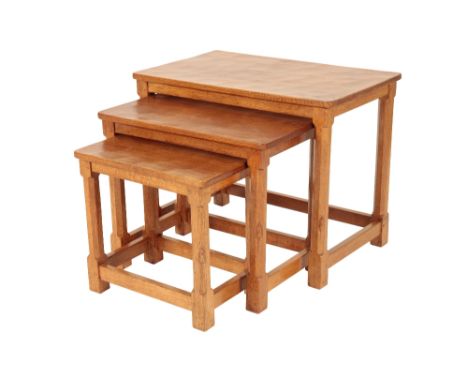 ROBERT THOMPSON "MOUSEMAN": AN OAK NEST OF THREE TABLES, adzed rectangular top on canted supports, carved mouse to leg, large