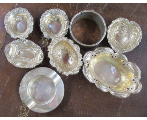 A collection of hallmarked silver, to include dishes and a bracelet