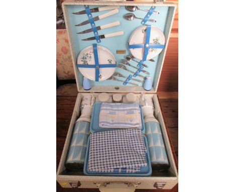 A Brexton picnic set, the hard case fitted with thermos flasks, plastic boxes, plates, cutlery etc