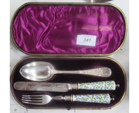 A 19th century silver plated christening set, the knife and fork with porcelain handles