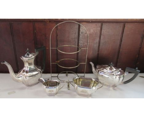 A silver plated three pieces tea set and other items