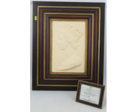 A Royal Worcester framed porcelain plaque, Portrait of Her Majesty Queen Elizabeth II modelled by Arnold Machin, to commemora