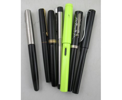 Seven vintage pens, to include a Conway Stewart No.58 and a Parker