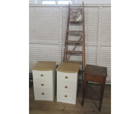 A pair of modern bedside chest of drawers, together with an oak sewing box on legs and a wooden step ladder (decorative purpo