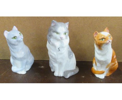 Three Royal Worcester models of cats