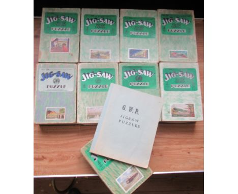 Nine Chad Valley GWR wooden jig-saw puzzles, with a catalogue