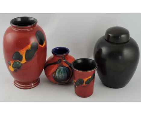 A Poole Pottery Odyssey pattern baluster shaped vase, H. 21cm, together with a basalt ginger jar and two other Poole items, (