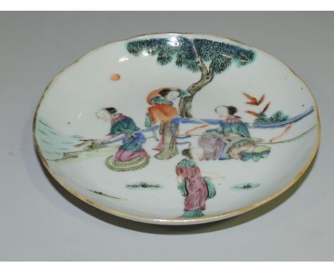 A 19th Century Chinese famille rose saucer dish decorated with four leisurely courtesans in garden terrace, bears six charact