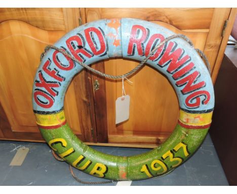 A decorative lifebuoy, with vintage style wording 'Oxford Rowing Club 1937', D. 70cm.