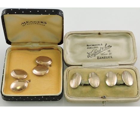 A pair of 9ct gold oval chain cufflinks, together with a pair of similar engine-turned gold-plated cufflinks.