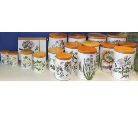 A set of seventeen Portmeirion 'Botanic Garden' pattern storage jars of various sizes with turned beech lids, together with a