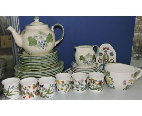 A Poole Pottery part tea service including teapot, milk jug and side plates, together with a set of six Portmeirion  'Botanic