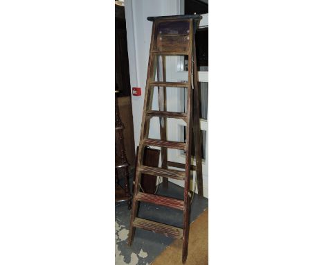 A vintage Henry L Cockle of Epson Denison seven tread pine stepladder.