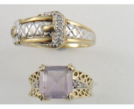 An amethyst and diamond set dress ring, the pierced shoulders incorporating diamonds, together with a buckle shaped ring, 10g