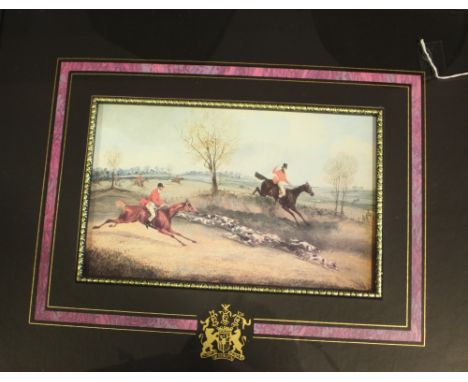 A pair of Victorian style hunting prints.