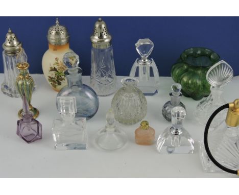 An Art Deco style scent bottle, clear glass of rectangular form with a stepped knop, together with ten various scent bottles 