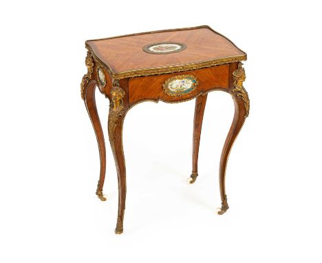 A French gilt brass mounted kingwood and tulipwood centre table, mid 19th Century, of Louis XV design, with a frieze drawer a