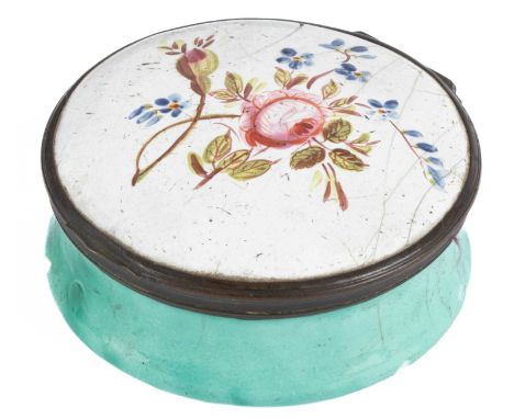 A South Staffordshire enamel snuff box,late 18th Century, of circular form, the lid painted with a rose spray, the box pale t