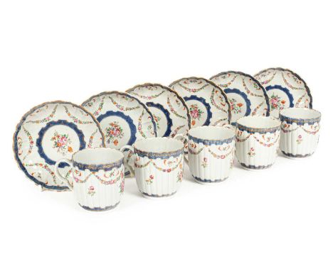 A set of five Chinese famille rose teacups and six saucers, Qianlong (1736-1795) of reeded and fluted form, painted with spra