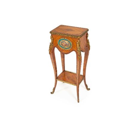 A Louis XV style ormolu mounted kingwood and tulipwood two-tier gueridon, the rectangular lifting top on square cabriole legs