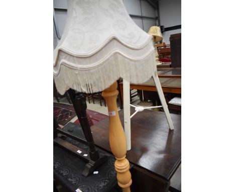A modern beech standard lamp