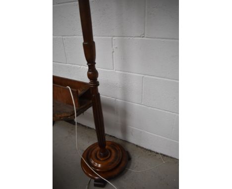 An early 20th century mahogany standard lamp