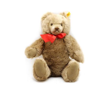 A Steiff teddy bear, 0202/41, with red ribbon, button to the ear, 41cm highCondition report: Overall good order.