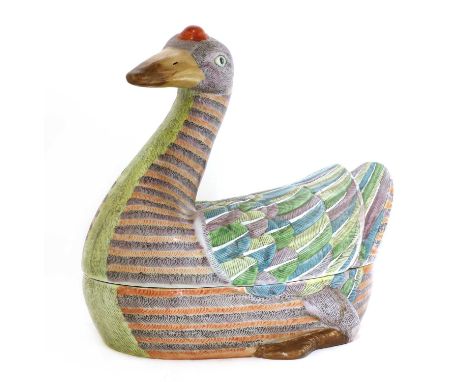 A large Chinese porcelain tureen and cover, in the form of a goose, the feathers moulded in relief covered with polychrome en