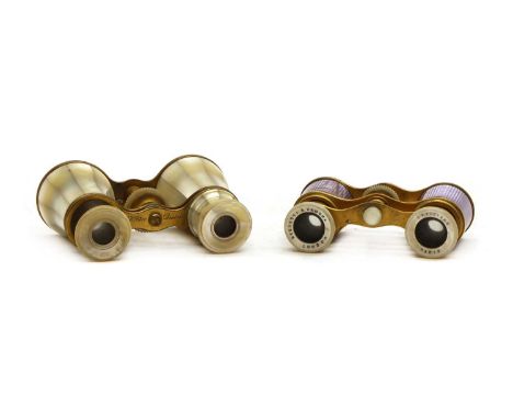A pair of Negretti &amp; Zambra opera glasses, the gilt metal frame with purple decoration, 9.5cm wide, together with one oth