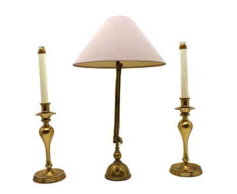 A pair of Christopher Wray brushed brass table lamps, with inverted baluster columns, stamped to base, 55cm high to the fitti