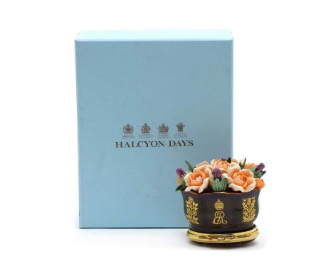 A Halcyon Days Royal Commemorative enamel and porcelain pot and cover, modelled as a basket of flowers, 'Her Majesty Queen El