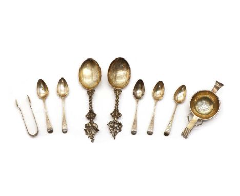 A pair of silver serving spoons, London 1894, a Danish silver tea strainer, and other silver flatware, approximately 9ozt (9)